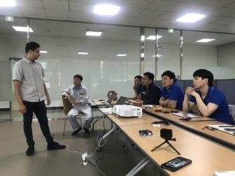 Leading a worker co-creation session in Korea